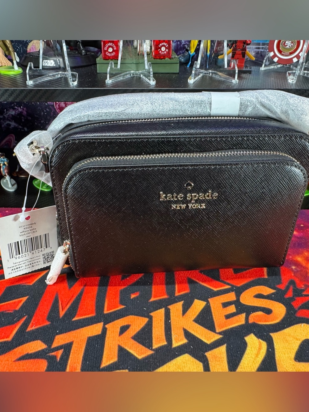 kate spade black Saffiano leather crossbody wallet